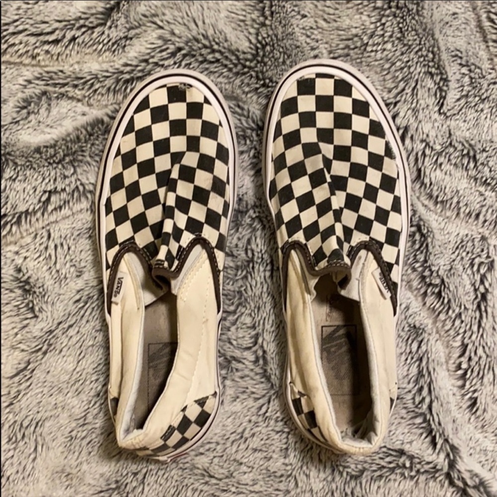 Checkered Vans with a few holes